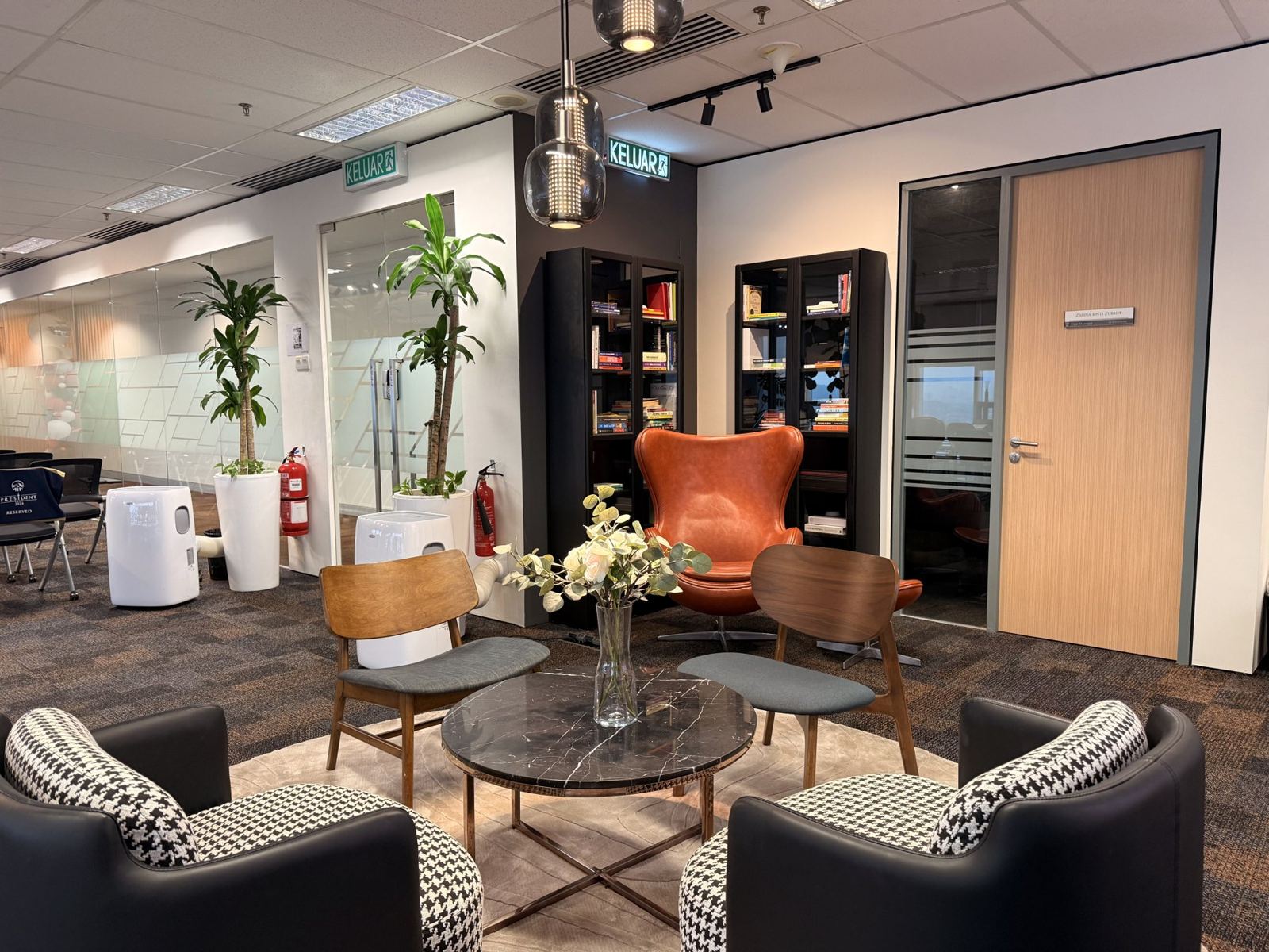 Lounge and reception with an orange armchair